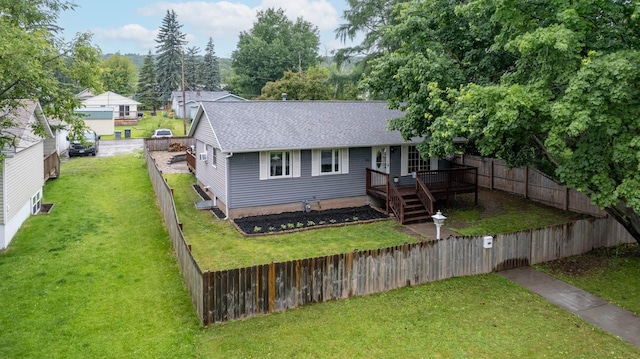 311 70th Ave W, Duluth, MN 55807 - view of front of property with a shingled roof, a fenced backyard, and a deck