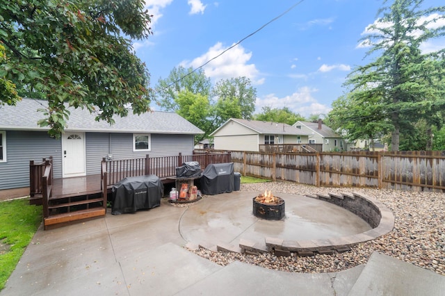311 70th Ave W, Duluth, MN 55807 - view of patio / terrace featuring an outdoor fire pit, a wooden deck, and a grill