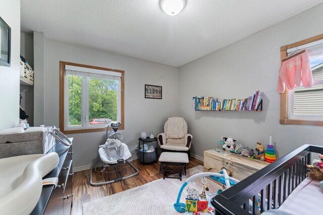 311 70th Ave W, Duluth, MN 55807 - bedroom with wood finished floors and baseboards