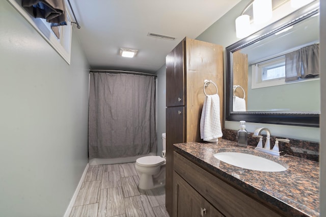 311 70th Ave W, Duluth, MN 55807 - bathroom featuring toilet and vanity