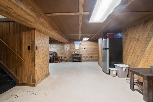 311 70th Ave W, Duluth, MN 55807 - finished basement with freestanding refrigerator, wood walls, and stairs