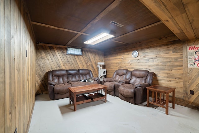 311 70th Ave W, Duluth, MN 55807 - living room featuring wooden walls and concrete floors