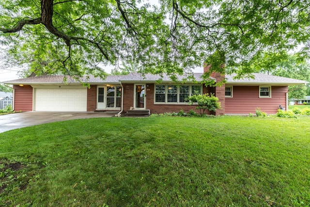 3890 Van Dyke St, White Bear Lake, MN 55110 - single story home featuring an attached garage, concrete driveway, a front yard, a chimney, and brick siding