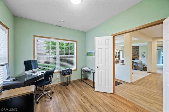 20177 Farnham Ln N, Forest Lake, MN 55025 - office featuring light wood-style flooring and a textured ceiling