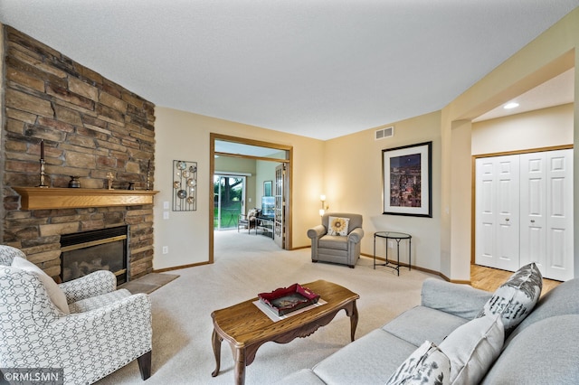 20177 Farnham Ln N, Forest Lake, MN 55025 - living area featuring light colored carpet and a stone fireplace