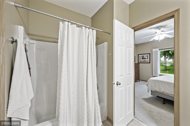 20177 Farnham Ln N, Forest Lake, MN 55025 - bathroom with shower / bath combo, ensuite bathroom, ceiling fan, and a textured ceiling