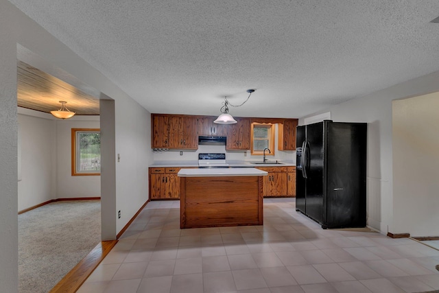 608 Summit Ave S, Sauk Rapids, MN 56379 - kitchen featuring black refrigerator with ice dispenser, electric stove, light countertops, brown cabinets, and a textured ceiling