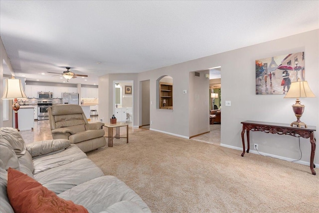 N6386 1317th St, Clifton Twp, WI 54021 - living room featuring a ceiling fan and light colored carpet