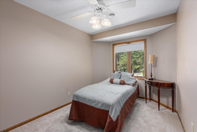 N6386 1317th St, Clifton Twp, WI 54021 - bedroom with light colored carpet, a ceiling fan, and a textured ceiling