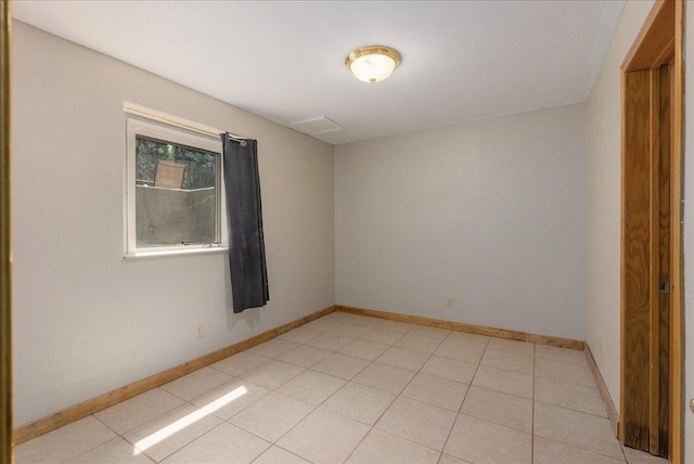 N6386 1317th St, Clifton Twp, WI 54021 - empty room featuring baseboards and light tile patterned flooring