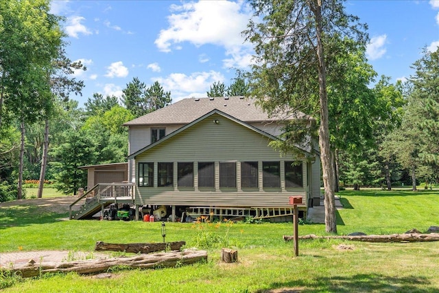 N6386 1317th St, Clifton Twp, WI 54021 - rear view of property with a sunroom, a yard, and a shingled roof
