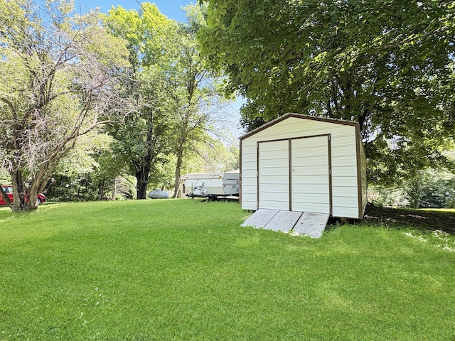 2890 216th St, Laketown Twp, WI 54853 - view of grassy yard with a storage shed