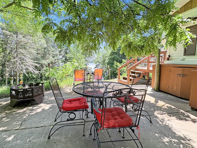 2890 216th St, Laketown Twp, WI 54853 - view of patio with stairs and outdoor dining space