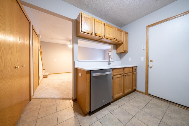 4316 Meghan Ln Unit 402, Eagan, MN 55122 - kitchen featuring dishwasher, a textured ceiling, light tile patterned floors, light countertops, and light carpet