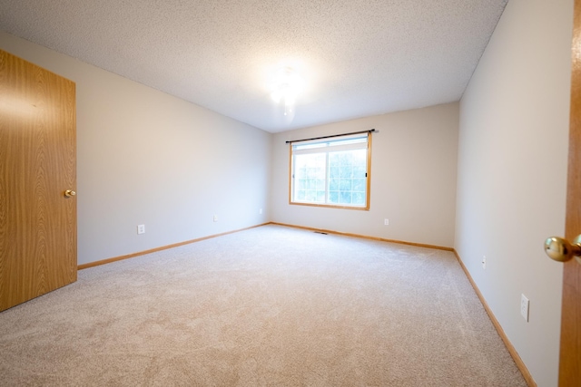 4316 Meghan Ln Unit 402, Eagan, MN 55122 - carpeted empty room with baseboards and a textured ceiling