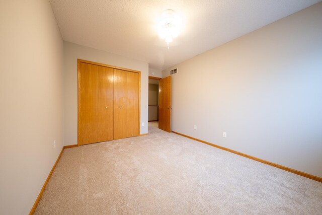 4316 Meghan Ln Unit 402, Eagan, MN 55122 - unfurnished bedroom with carpet flooring and a closet