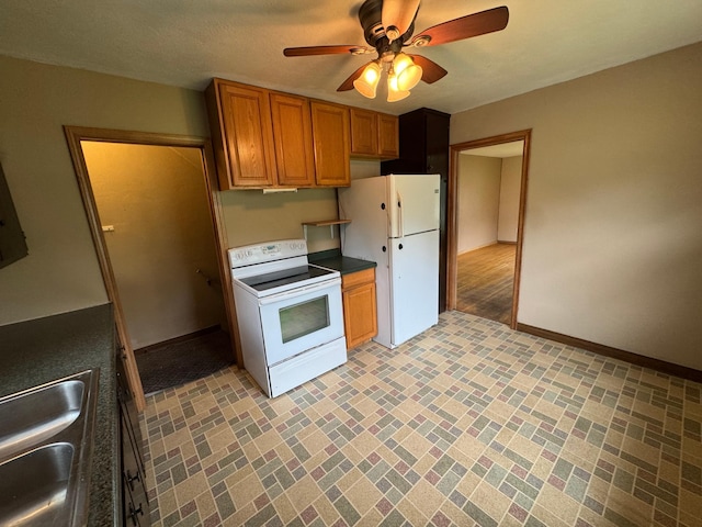 2100 14th St SE, Rochester, MN 55904 - kitchen featuring white appliances, brown cabinetry, a ceiling fan, brick patterned flooring, and dark countertops