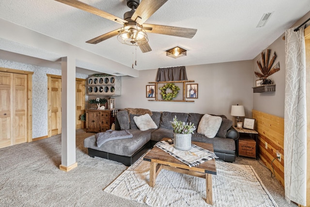 2029 Richardson Ct, Georgetown Twp, WI 54853 - living room featuring carpet flooring, ceiling fan, and a textured ceiling
