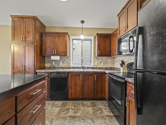 9185 Golden Pond Ln N, Monticello, MN 55362 - kitchen with black appliances, backsplash, pendant lighting, and stone finish flooring