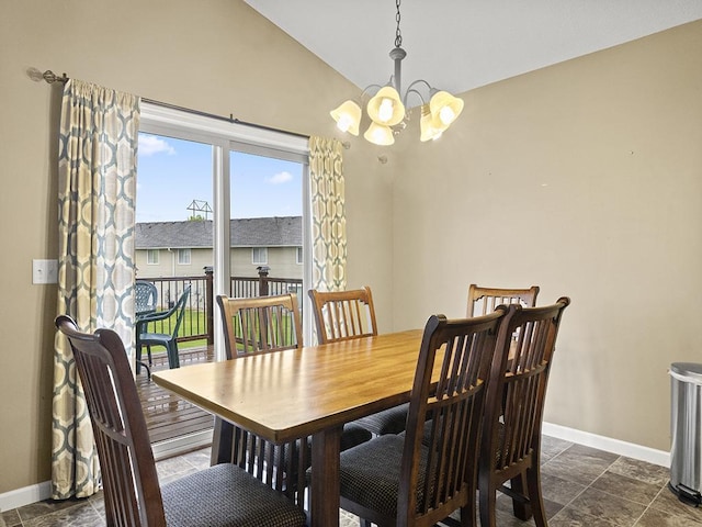9185 Golden Pond Ln N, Monticello, MN 55362 - dining room featuring a chandelier, lofted ceiling, and dark stone finish floors