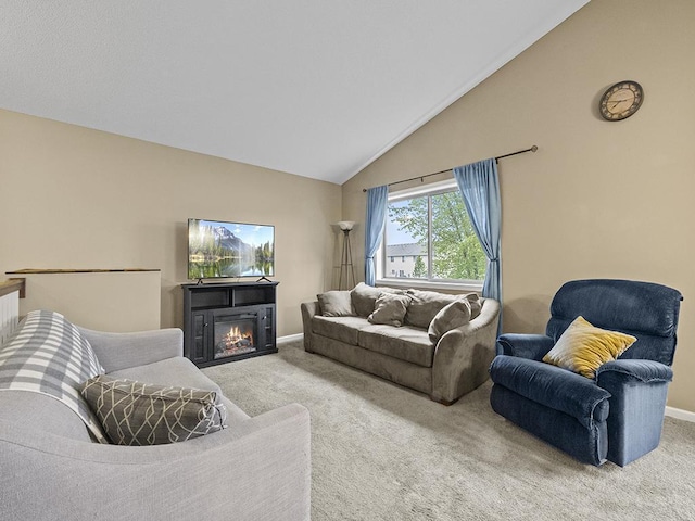 9185 Golden Pond Ln N, Monticello, MN 55362 - carpeted living area with a glass covered fireplace and high vaulted ceiling