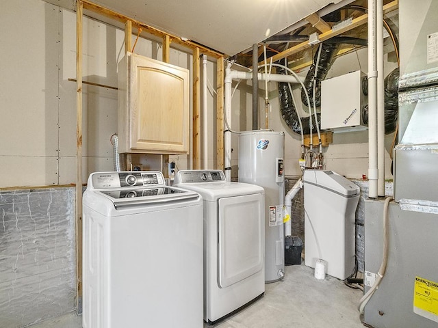 9185 Golden Pond Ln N, Monticello, MN 55362 - washroom with independent washer and dryer, electric water heater, cabinet space, and heating unit