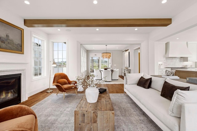 956 Mississippi River Blvd S, Saint Paul, MN 55116 - living room with beamed ceiling, wood finished floors, recessed lighting, and a glass covered fireplace