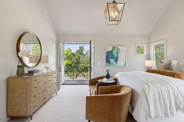 956 Mississippi River Blvd S, Saint Paul, MN 55116 - bedroom featuring access to exterior, a chandelier, multiple windows, light colored carpet, and high vaulted ceiling