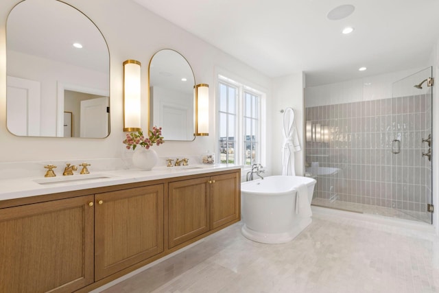 956 Mississippi River Blvd S, Saint Paul, MN 55116 - bathroom featuring double vanity, a stall shower, a soaking tub, and recessed lighting
