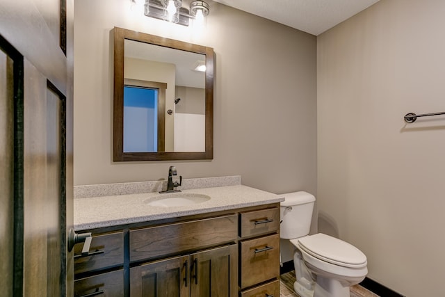 893 Grant St, Ellsworth, WI 54011 - bathroom with toilet and vanity