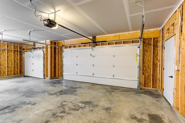 893 Grant St, Ellsworth, WI 54011 - garage featuring a garage door opener