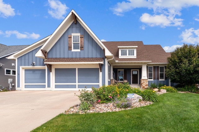 9914 8th St N, Lake Elmo, MN 55042 - craftsman inspired home featuring board and batten siding, a shingled roof, concrete driveway, and a front yard