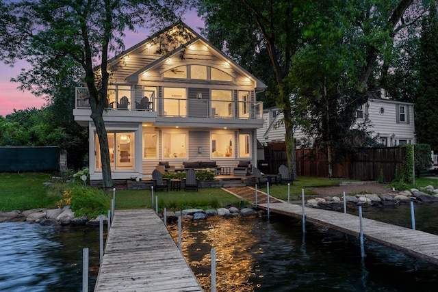 2807 Mckenzie Point Rd, Minnetonka, MN 55391 - rear view of property with a balcony, an outdoor hangout area, a water view, and a patio area