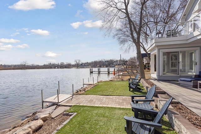 2807 Mckenzie Point Rd, Minnetonka, MN 55391 - view of green lawn with a boat dock, a water view, a patio area, and a balcony