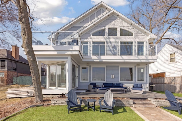 2807 Mckenzie Point Rd, Minnetonka, MN 55391 - back of property with a balcony, an outdoor hangout area, and a patio