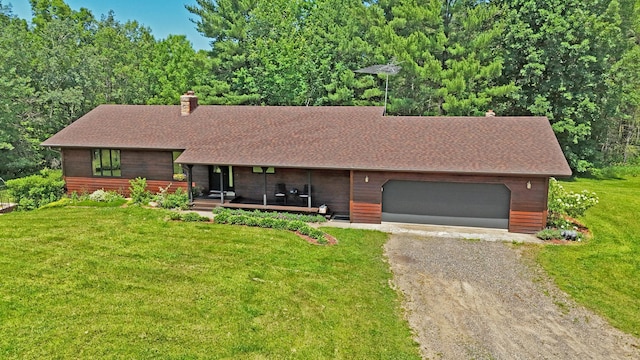 22761 105th Ave, Milaca, MN 56353 - view of front facade with driveway, a chimney, a front lawn, a garage, and roof with shingles