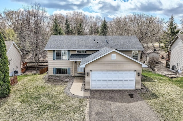 12740 Eveleth Path, Apple Valley, MN 55124 - traditional-style house featuring driveway, roof with shingles, and a garage