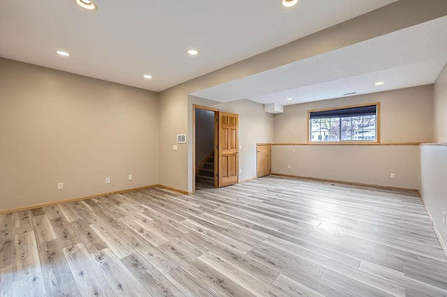 12740 Eveleth Path, Apple Valley, MN 55124 - unfurnished room featuring stairs, light wood-style floors, and recessed lighting