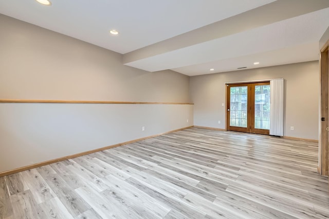 12740 Eveleth Path, Apple Valley, MN 55124 - unfurnished room featuring light wood-type flooring, recessed lighting, and french doors