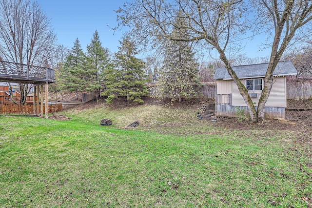 12740 Eveleth Path, Apple Valley, MN 55124 - view of yard with a deck and an outbuilding