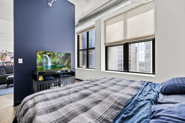 350 Saint Peter St Unit 707, Saint Paul, MN 55102 - bedroom featuring multiple windows