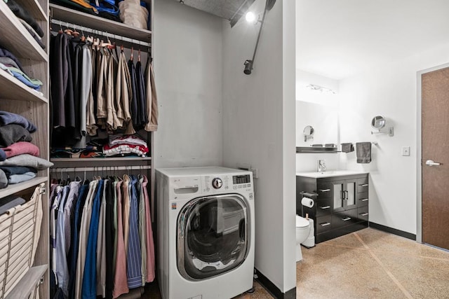 350 Saint Peter St Unit 707, Saint Paul, MN 55102 - laundry room with washer / clothes dryer and baseboards