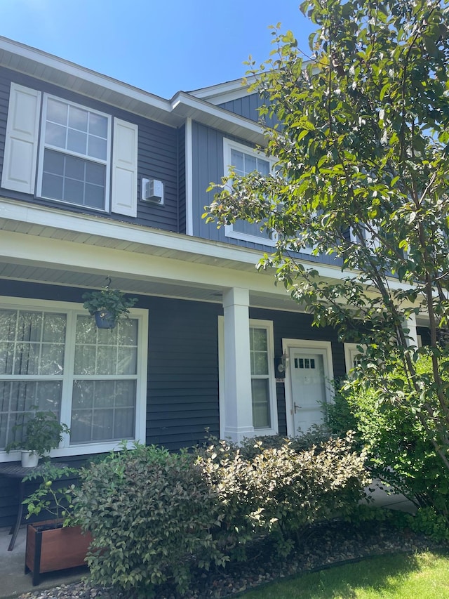 14375 Banyan Ln, Rosemount, MN 55068 - view of front of home featuring board and batten siding and a porch