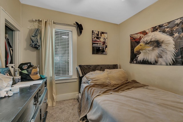 208 27th Ave N, Saint Cloud, MN 56303 - bedroom featuring light carpet and baseboards