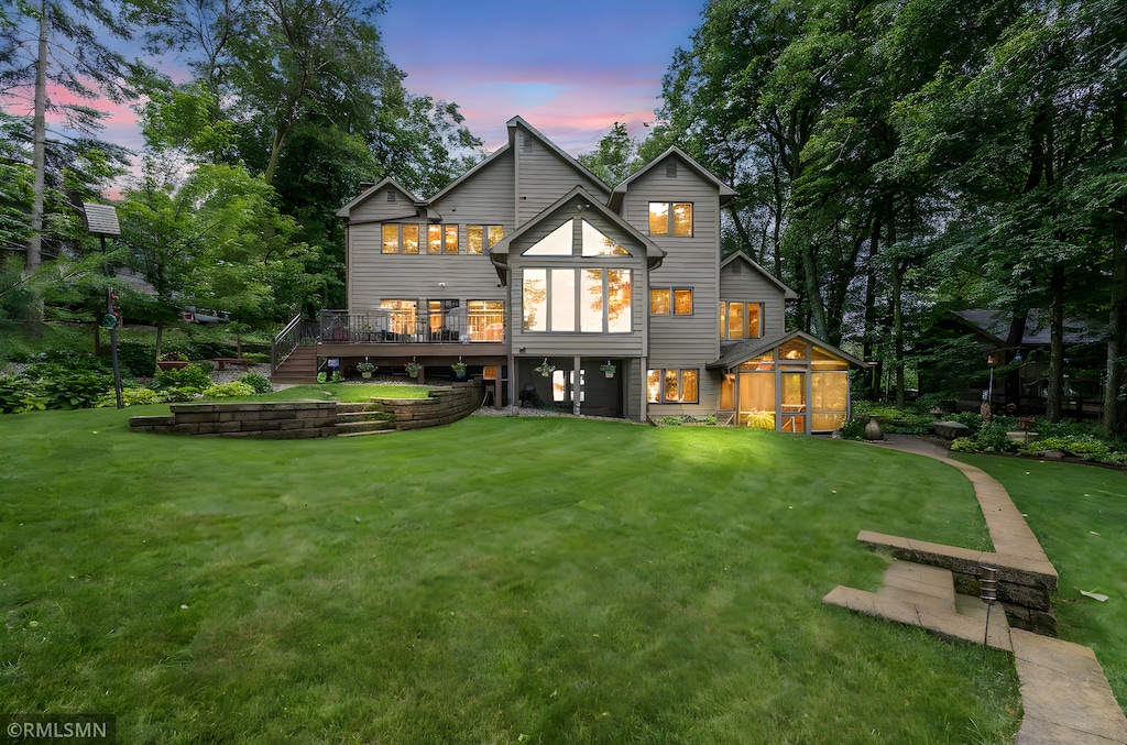 4208 Fairview Ln, Madison Lake, MN 56063 - rear view of house with a lawn and a deck
