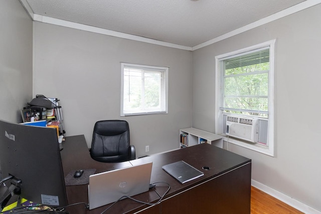 310 4th Ave SW, Hutchinson, MN 55350 - home office with healthy amount of natural light, wood finished floors, crown molding, and cooling unit