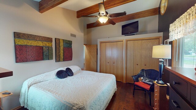 2017 Highland Ave, Albert Lea, MN 56007 - bedroom with beamed ceiling, multiple closets, dark wood-style flooring, and a ceiling fan
