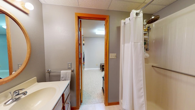 2017 Highland Ave, Albert Lea, MN 56007 - bathroom featuring curtained shower, a drop ceiling, and vanity