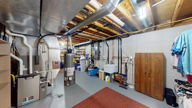 2017 Highland Ave, Albert Lea, MN 56007 - unfinished basement featuring gas water heater and concrete block wall