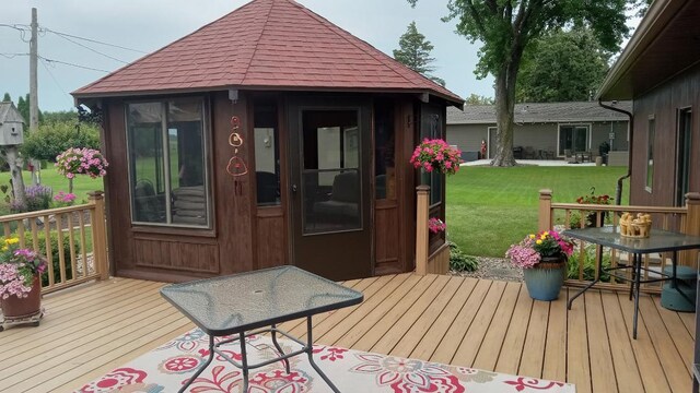 2017 Highland Ave, Albert Lea, MN 56007 - wooden deck featuring a yard